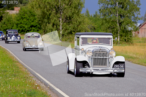 Image of White Essex Super Six 1929 Cruising on Country Road