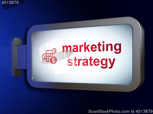 Image of Advertising concept: Marketing Strategy and Calculator on billboard background