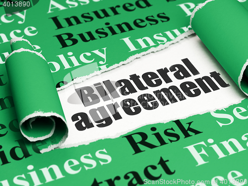 Image of Insurance concept: black text Bilateral Agreement under the piece of  torn paper