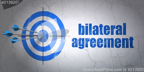 Image of Insurance concept: target and Bilateral Agreement on wall background