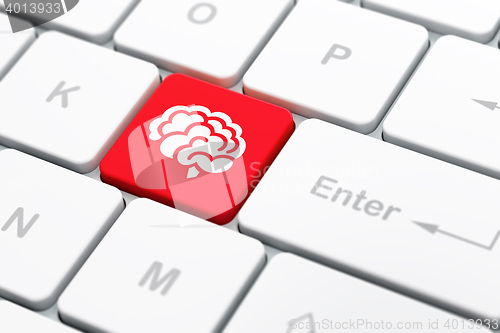 Image of Science concept: Brain on computer keyboard background