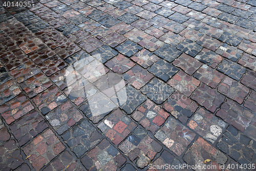 Image of stone road after rain