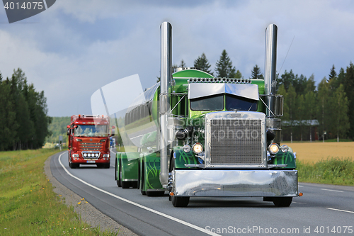 Image of Green Peterbilt 359 Tank Truck in Truck Convoy