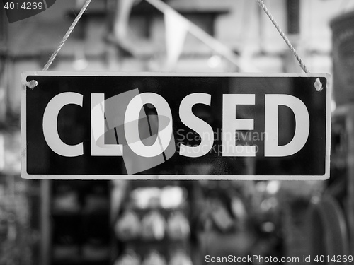 Image of Closed sign on a shop window