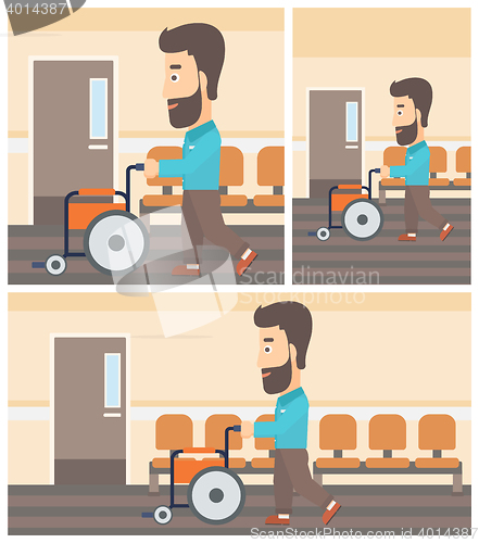 Image of Man pushing wheelchair.