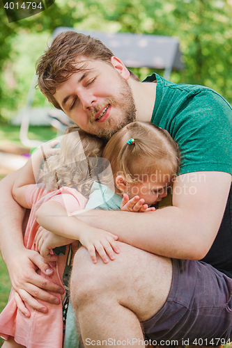 Image of Happy family and father\'s day. child daughters hugging dad