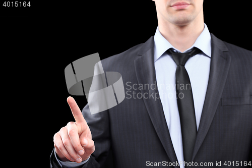 Image of Business Man pushing on a touch screen interface