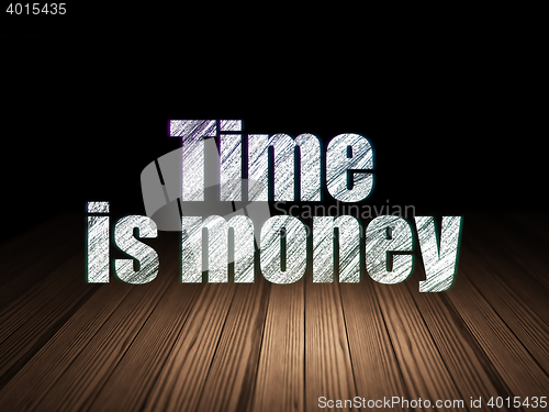 Image of Business concept: Time Is money in grunge dark room