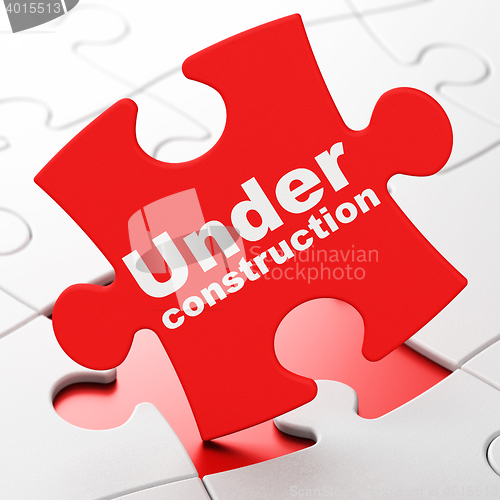 Image of Web design concept: Under Construction on puzzle background