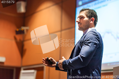 Image of Speaker giving talk at Business Conference.