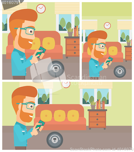 Image of Man controlling vacuum cleaner with smartphone.