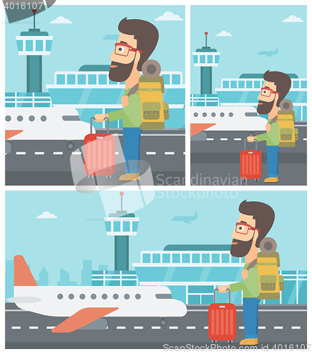 Image of Man at the airport with suitcase.