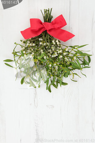 Image of Mistletoe with Red Bow
