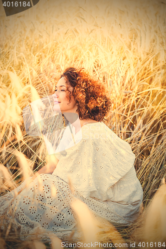 Image of beautiful smiling woman outdoors