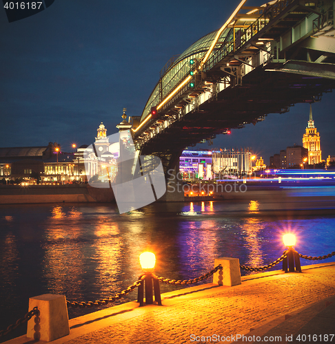 Image of night cityscape on river in Moscow, Russia