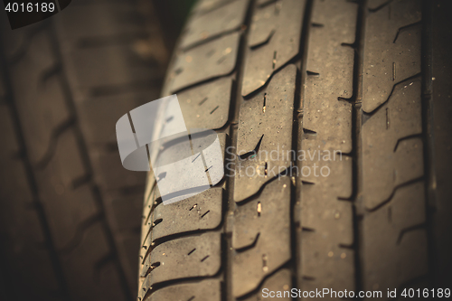 Image of worn-out tires close up