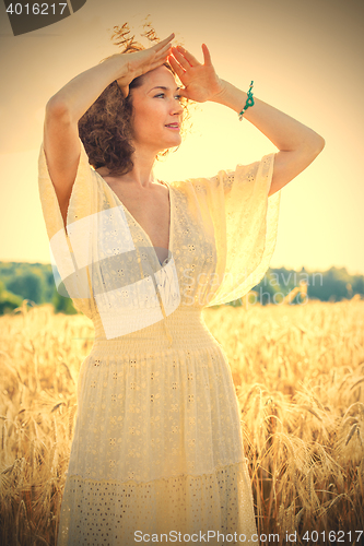 Image of Beautiful Woman Outdoors enjoying nature