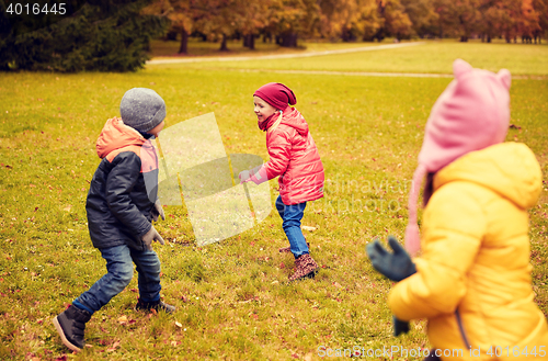 Image of group of happy little kids running outdoors