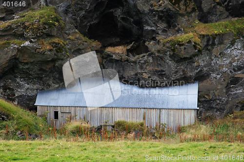 Image of House under the cliff