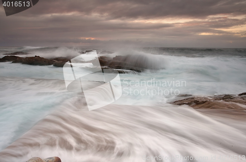 Image of Sunrise and Ocean overflows
