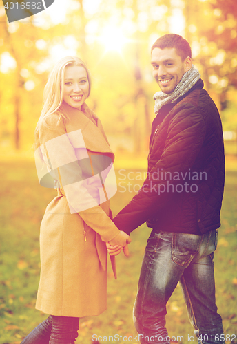 Image of romantic couple in the autumn park