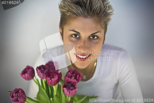 Image of woman and flowers