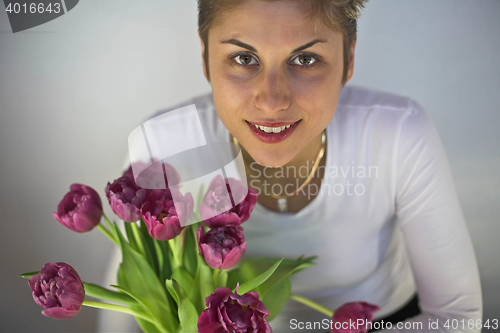 Image of woman and flowers