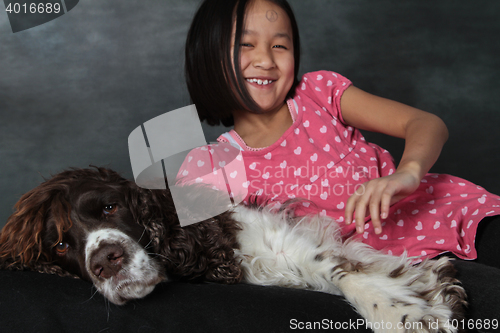 Image of Child and dog