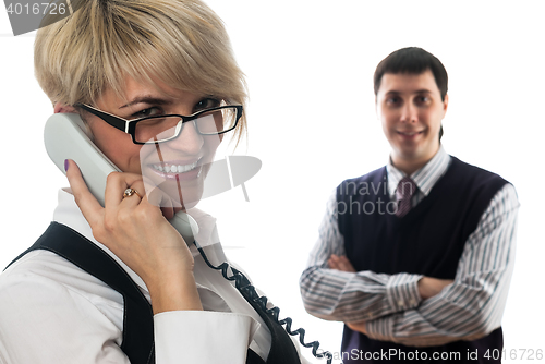 Image of Businesswoman talking by mobile