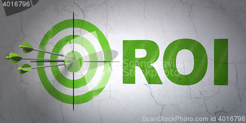 Image of Finance concept: target and ROI on wall background
