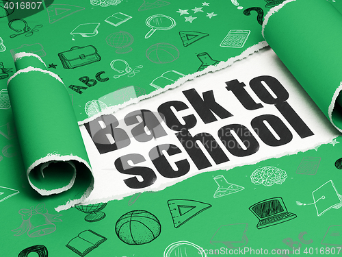 Image of Studying concept: black text Back to School under the piece of  torn paper