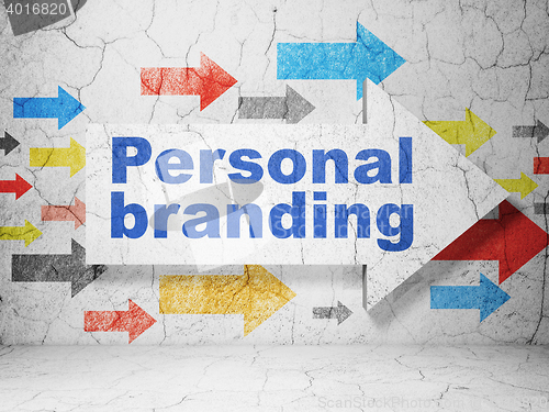 Image of Advertising concept: arrow with Personal Branding on grunge wall background