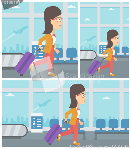Image of Woman walking with suitcase at the airport.