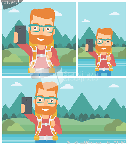 Image of Man with backpack making selfie.