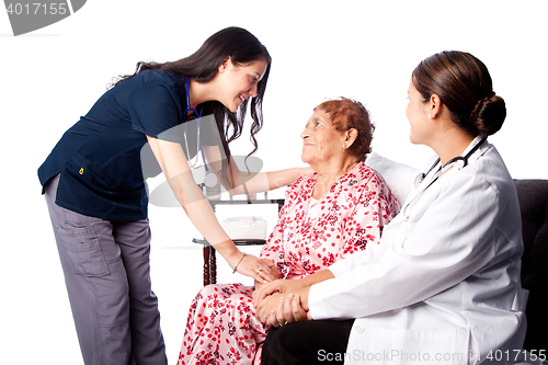 Image of Doctor and Nurse consulting Senior Patient