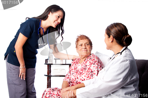 Image of Doctor and Nurse consulting Senior Patient