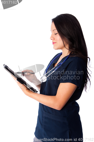 Image of Nurse writing digital patient chart