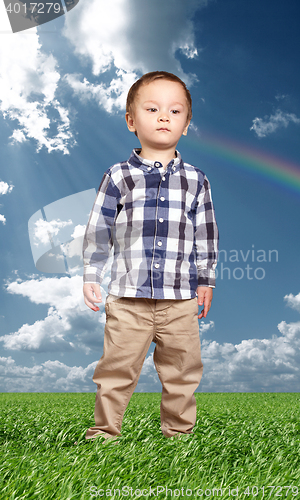 Image of Little Baby Boy In Green Grass