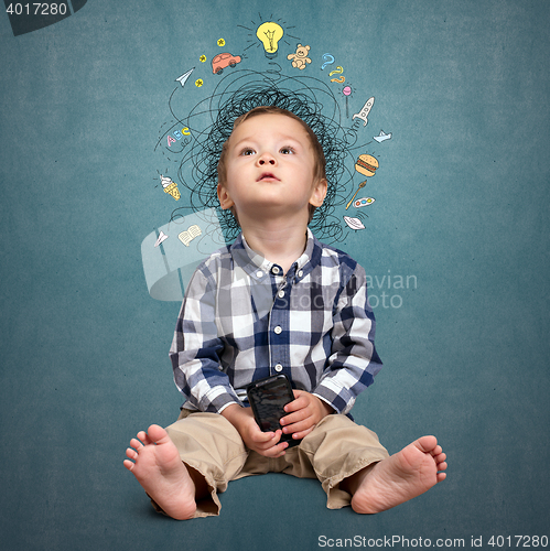 Image of Little boy thinking