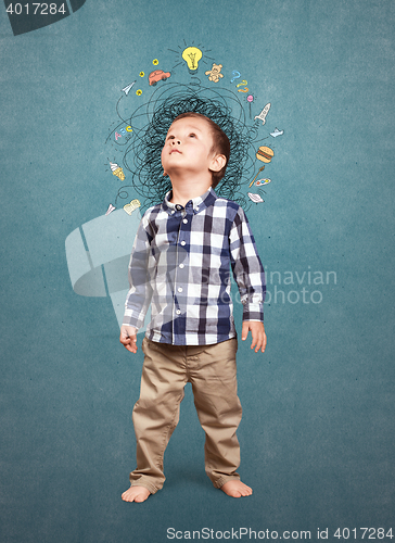 Image of Little boy thinking