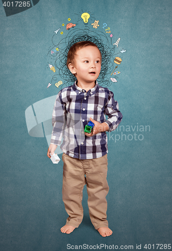 Image of Little boy thinking