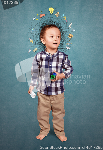 Image of Little boy thinking