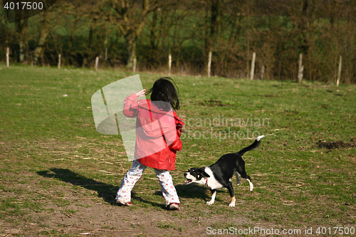 Image of Child and dog