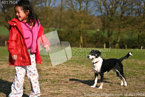 Image of Child and dog