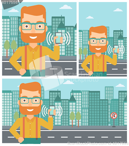 Image of Man holding ringing telephone.