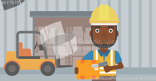 Image of Warehouse worker scanning barcode on box.