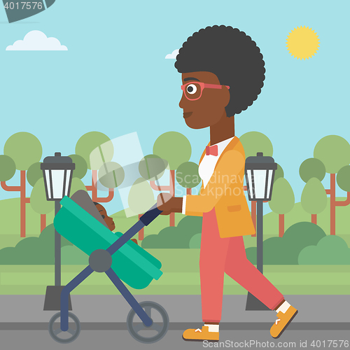 Image of Mother walking with her baby in stroller.