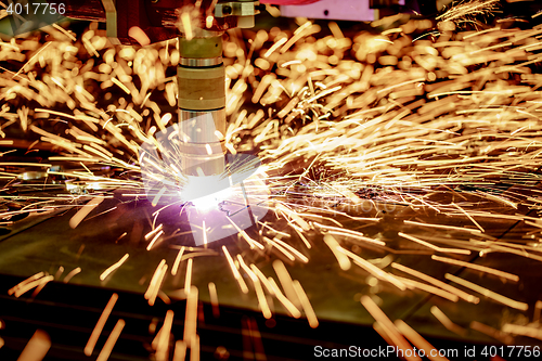 Image of CNC Laser plasma cutting of metal, modern industrial technology.