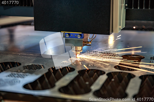 Image of CNC Laser cutting of metal, modern industrial technology. .