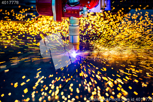 Image of CNC Laser plasma cutting of metal, modern industrial technology.